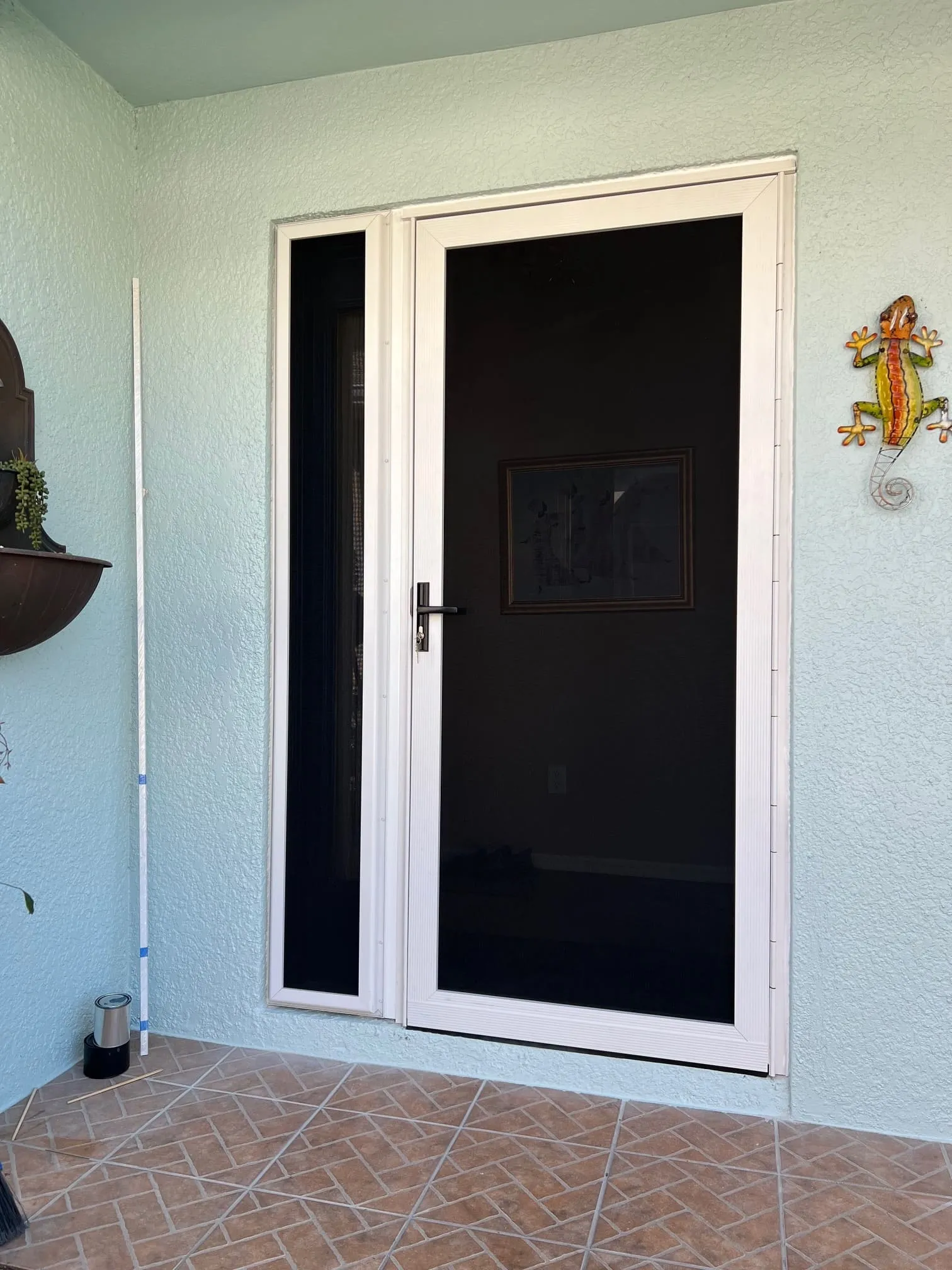 Fixed hurricane screens