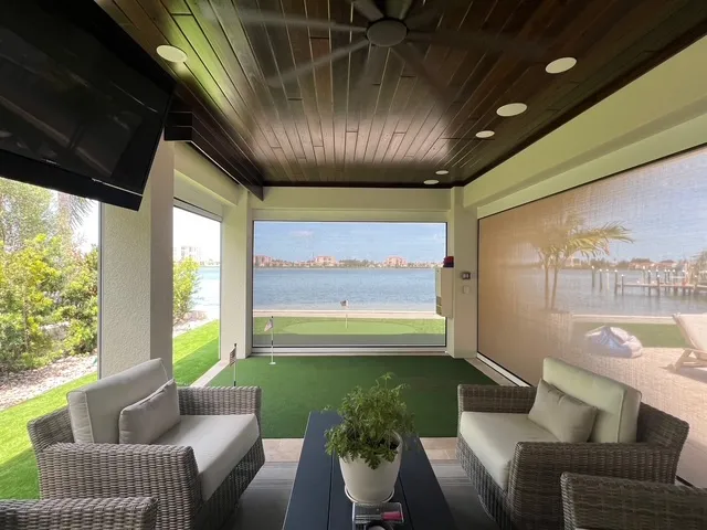 Motorized hurricane, solar, insect screens