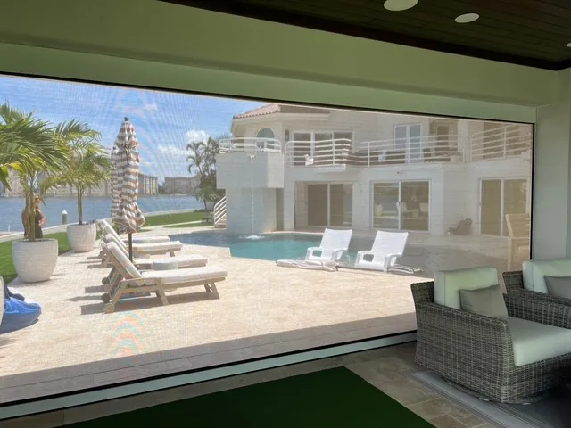 Motorized hurricane, solar, insect screens