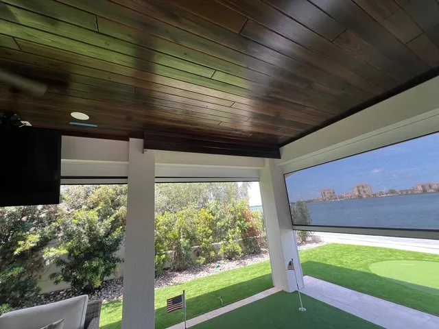 Motorized hurricane, solar, insect screens