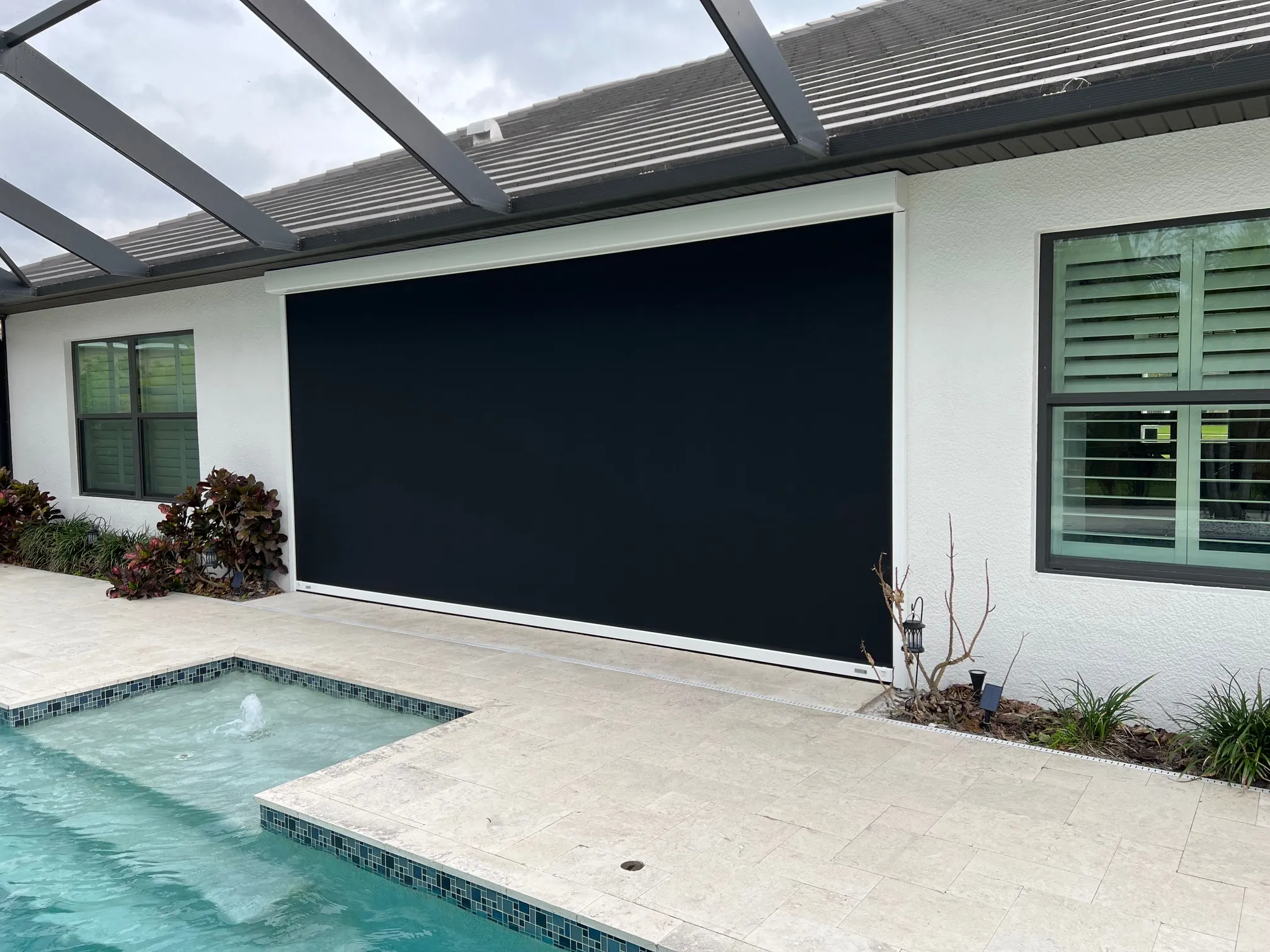 Motorized hurricane, solar, insect screens