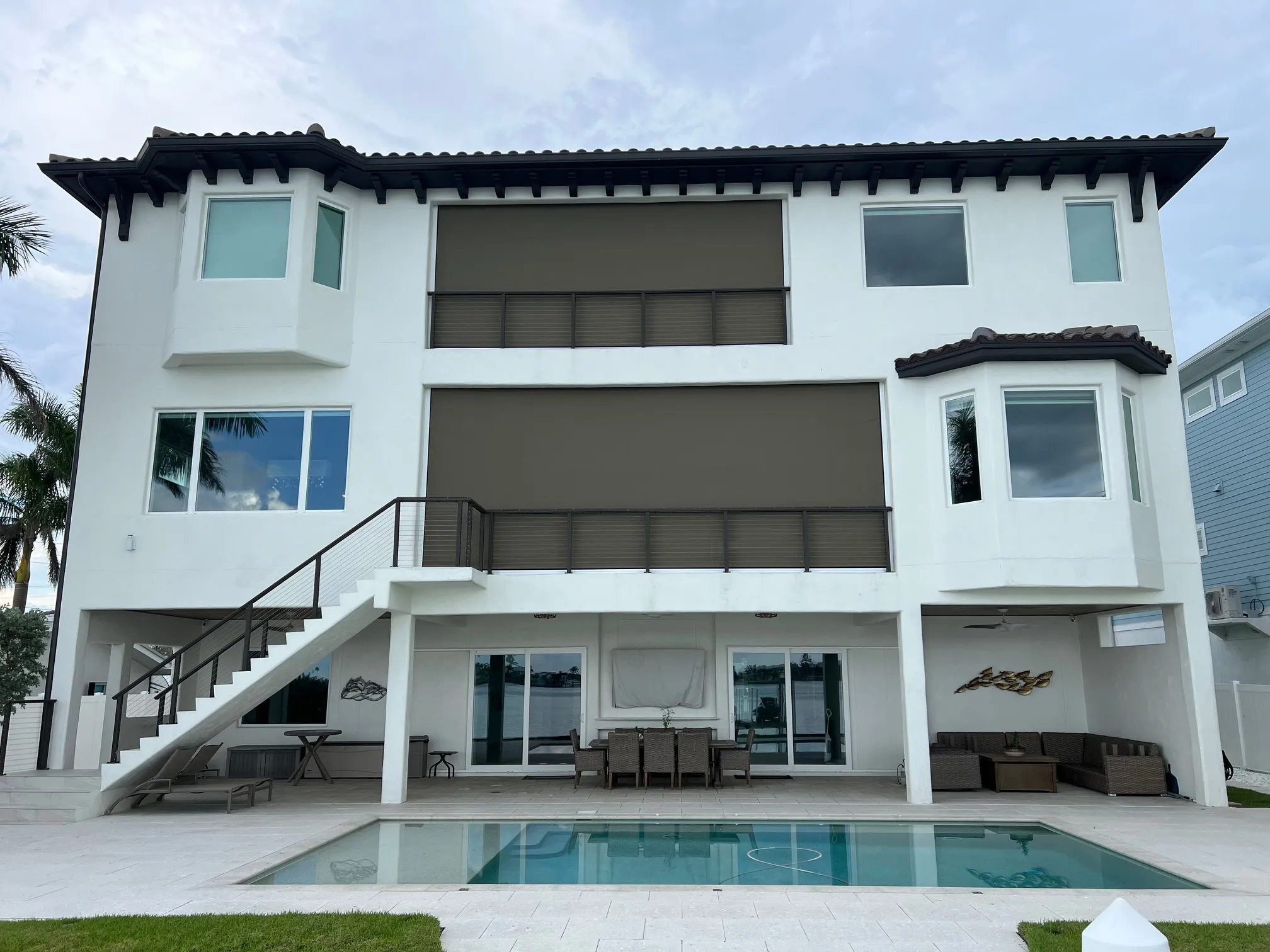 Motorized hurricane, solar, insect screens