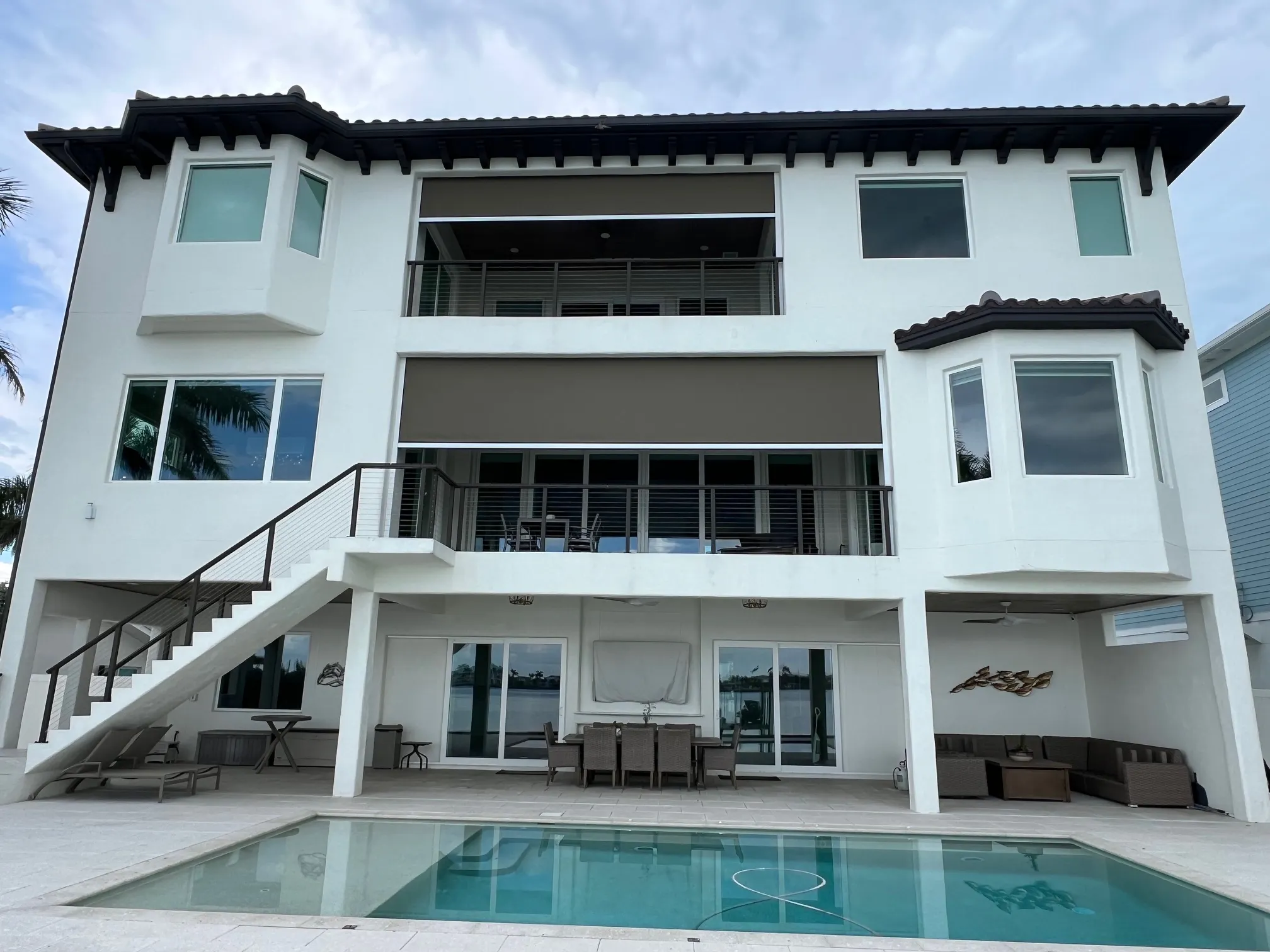 Motorized hurricane, solar, insect screens